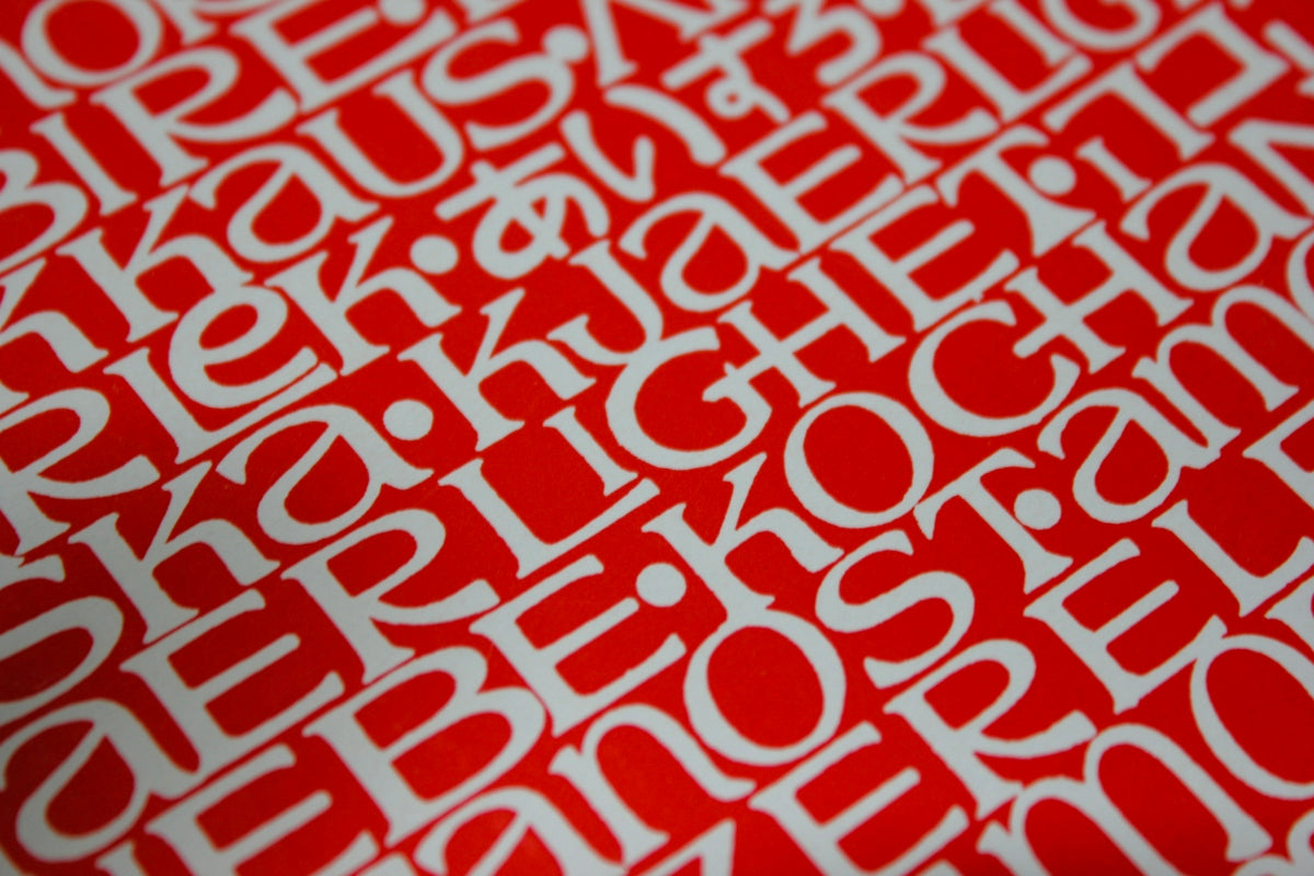 red and white paisley textile