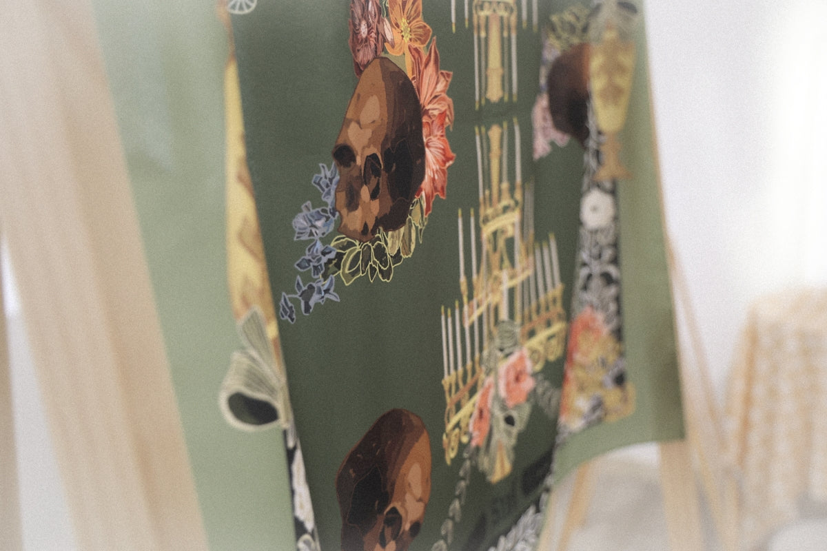 a close up of a piece of paper with a skull on it