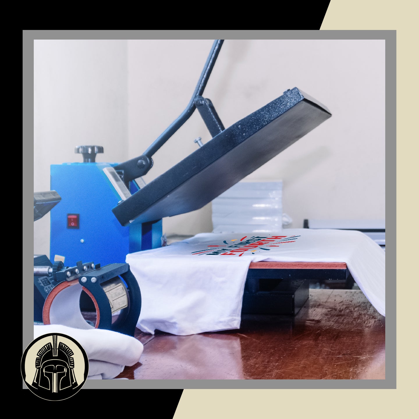Large industrial heat press on a wooden table with a white t-shirt