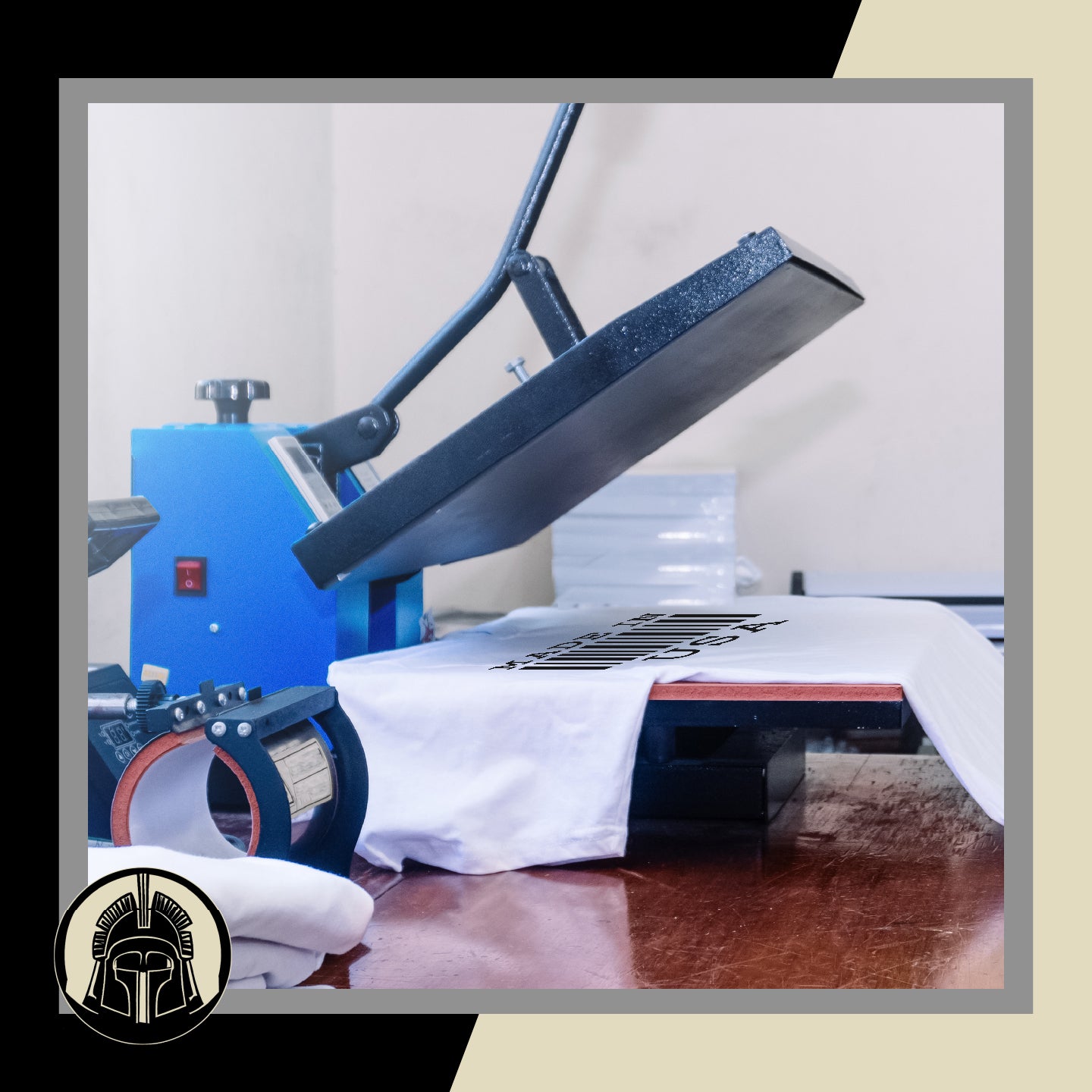 Large industrial heat press on a wooden table with a white t-shirt