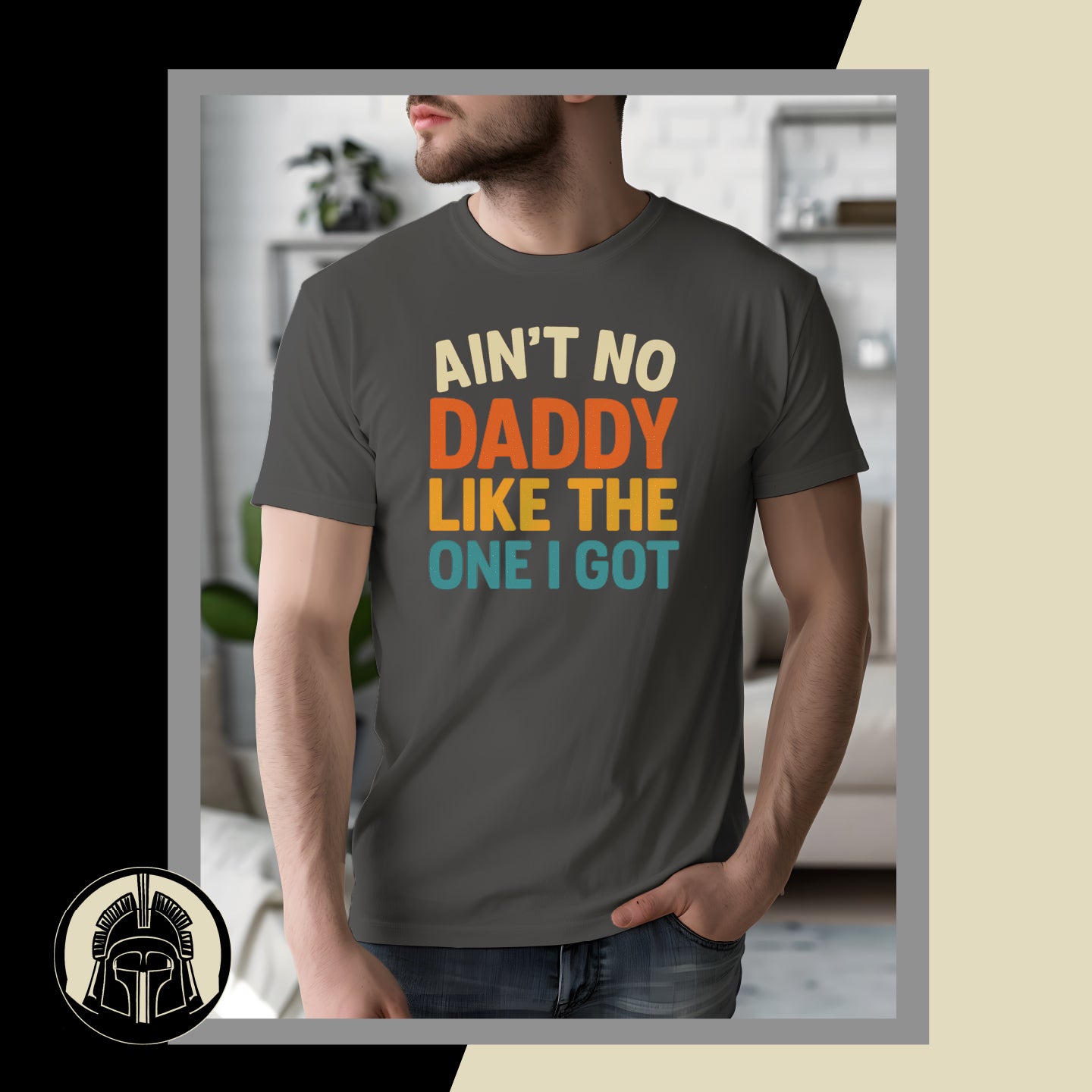 Person wearing a dark gray t-shirt with colorful text in a living room setting